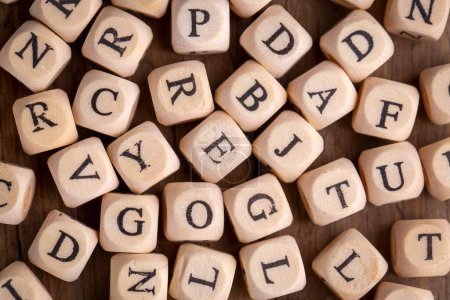 Photo for Random sorted wooden alphabet letters - Royalty Free Image