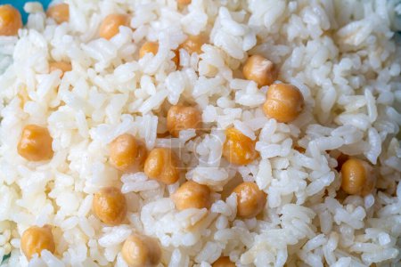 Photo for Turkish Rice with chickpea served, Turkish name; Nohutlu pilav or pilaf - Royalty Free Image