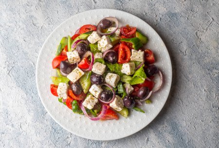 Photo for Greek salad with fresh vegetables, feta cheese and kalamata olives. Healthy food. - Royalty Free Image