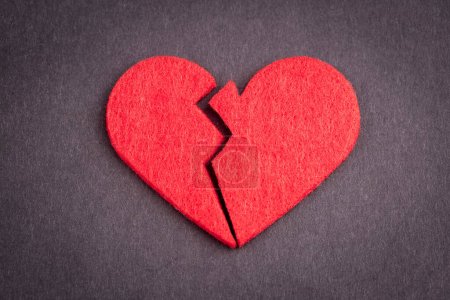 Photo for Broken heart on black background - Royalty Free Image
