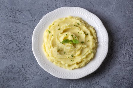 Serving of creamy mashed potato made from boiled potatoes