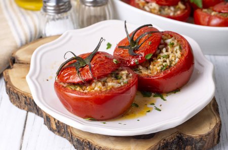 Photo for Traditional Turkish food; Stuffed tomatoes with olive oil stuffed with rice. Turkish name; domates dolmasi - Royalty Free Image