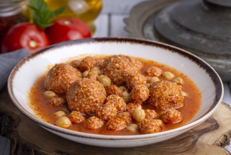 Photo for Traditional delicious Turkish foods; Bulgur soup (Turkish name; Anali Kizli, icli kofte) - Royalty Free Image