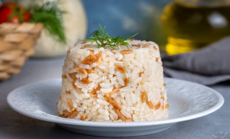 Photo for Traditional delicious Turkish food; Turkish style rice pilaf (Turkish name; Arpa sehriyeli pirinc pilavi) - Royalty Free Image