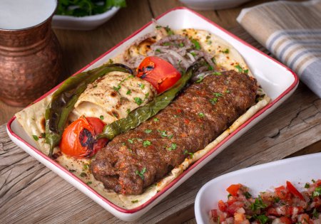 Photo for Traditional delicious Turkish foods; Adana kebab - Royalty Free Image