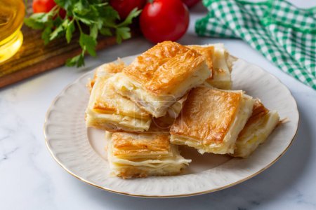 Photo for Delicious Turkish Tray pastry, Su boregi with cheese. Adana borek. - Royalty Free Image