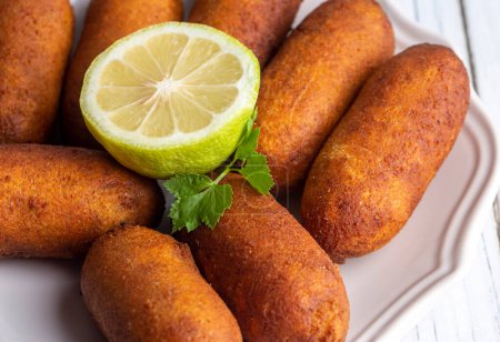 Photo for Kibbeh is a popular dish in Middle Eastern cuisine (Turkish name; icli kofte) - Royalty Free Image