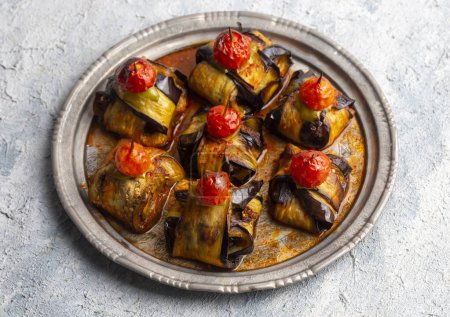 Photo for Traditional delicious Turkish food; Kofte kebab wrapped in eggplant (Turkish name; Islim - islim kebabi or kurdan kebabi) - Royalty Free Image