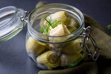 Photo for Pickled Artichoke Hearts with Marinated in Plate. - Royalty Free Image