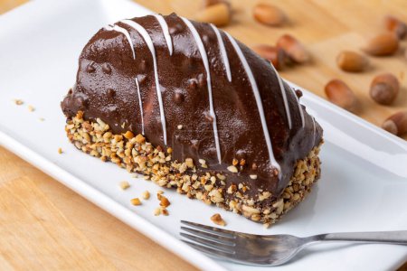 Photo for Malaga Dessert - Chocolate Eclairs with peanut - hazelnut and banana - Royalty Free Image