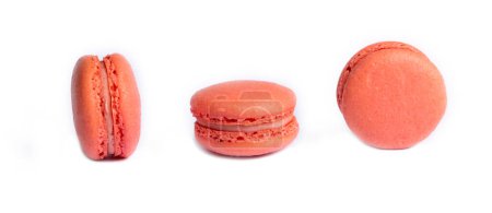 Photo for Pink macaroon cakes. Small french muffins. Colorful macarons on a white background - Royalty Free Image