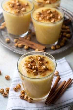 Photo for Boza or Bosa, traditional Turkish drink with roasted chickpea - Royalty Free Image