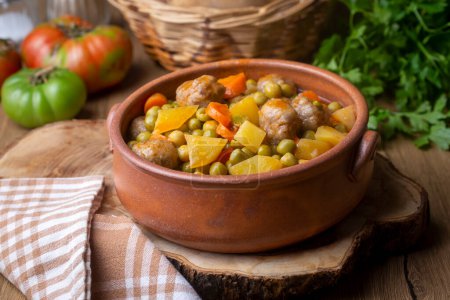 Photo for Turkish Food Green Pea Stew with Meatballs - Kofte or Kofta Bezelye. (Turkish name; kofteli bezelye) - Royalty Free Image