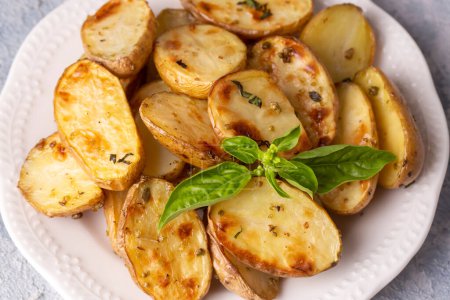 Photo for Delicious baked potato with green garlic - Royalty Free Image