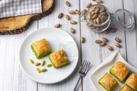 Photo for Traditional delicious Turkish dessert; pistachio baklava (Turkish name; kuru baklava) - Royalty Free Image