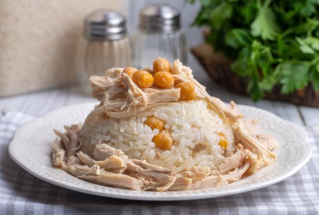 Photo for Traditional delicious Turkish food; Rice with chickpeas and chicken (Turkish name; Tavuklu nohutlu pilav or pilaf) - Royalty Free Image