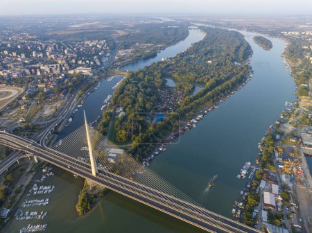 View of Ada Ciganlija from aerial drone and Most na Adi bridge over Sava River. Belgrade - Serbia