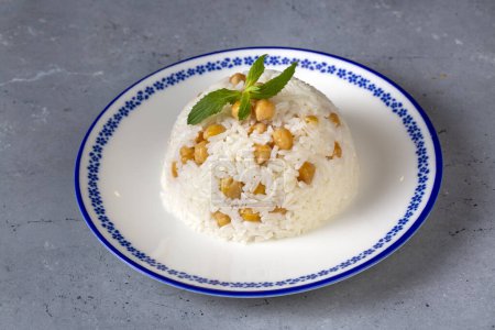Photo for Turkish Rice with chickpea served, Turkish name; Nohutlu pilav or pilaf - Royalty Free Image