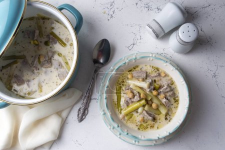Photo for Siveydiz; (Turkey - Antep Style Local Food) is an Antep dish made with fresh garlic and lamb. Turkish name; Siveydiz - Royalty Free Image