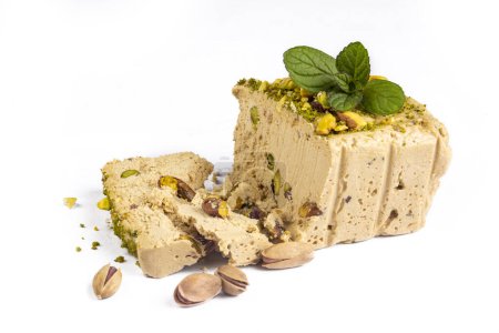 Photo for Sesame halva with pistachios on grey background. Top view. Copy space. Traditional middle eastern sweets. Jewish, turkish, arabic national dessert. Turkish delight. - Royalty Free Image