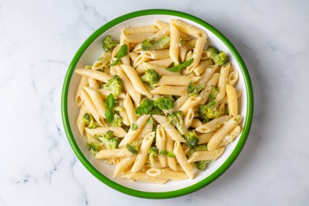 Photo for Creamy penne pasta with homemade broccoli and cheese. Turkish name; brokolili makarna - Royalty Free Image