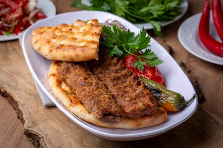 Photo for Traditional delicious Turkish foods; Adana kebab - Royalty Free Image