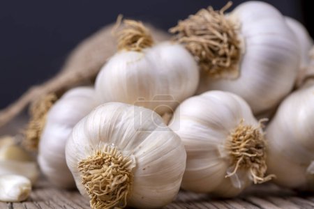 Photo for Fresh garlic on vintage table - Royalty Free Image