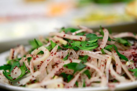 Photo for Turkish onion salad is served with kebabs accompanied by lemon and parsley. - Royalty Free Image