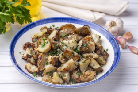 Photo for Homemade Roasted Jerusalem Artichoke Sunchokes with Garlic and Cheese - Royalty Free Image