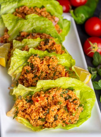 Photo for Traditional delicious Turkish foods: bulgur salad (kisir) - Royalty Free Image