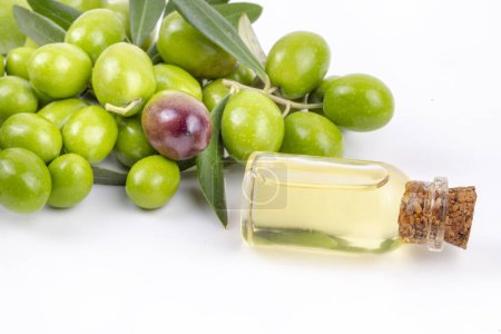 Photo for Green olive and olive oil isolated - Royalty Free Image
