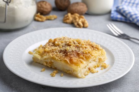 Photo for Laz pastry; It is a dessert made with phyllo dough, butter, pudding and sherbet. Turkish name; Laz boregi - Royalty Free Image