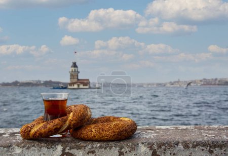 Photo for Maiden Tower (Kiz Kulesi), Turkish tea and Turkish bagel, Istanbul / Turkey - Royalty Free Image