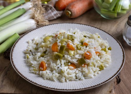 Photo for Rice with leeks from traditional Turkish cuisine - Turkish name; pirasali pirinc pilavi - Royalty Free Image