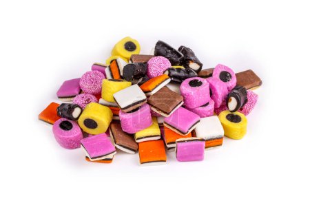 Téléchargez les photos : Liquorice allsorts fondant and licorice sweets or candy studio isolated - en image libre de droit