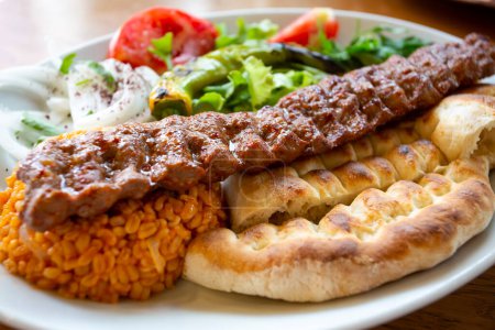 Photo for Traditional delicious Turkish foods; grilled meat, Adana kebab - Royalty Free Image