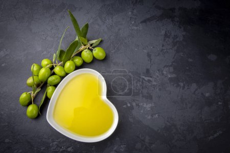 Photo for Green olive and olive oil isolated - Royalty Free Image