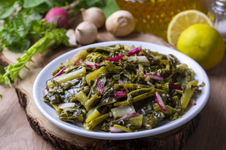 Photo for Traditional Turkish appetizers; Aegean Herbs Salad, Radish Salad. Turkish name; ege otlari mezesi or salatasi - Royalty Free Image