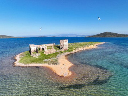 Photo for Historic ancient monastery on an island around the Patrica beach. Shooting with drone. (Turkish name; kizlar manastiri) Cunda - Ayvalik - Turkey - Royalty Free Image
