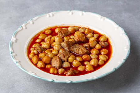 Photo for Traditional delicious Turkish foods; Turkish Food Chickpeas with Meat. Turkish name; Etli nohut - Royalty Free Image