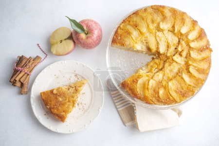 Photo for Caramelized apple cake is a delicious dessert. Turkish name; elmali kek - Royalty Free Image