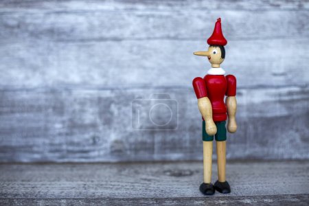 Photo for Traditional classic wooden pinocchio figure - Royalty Free Image