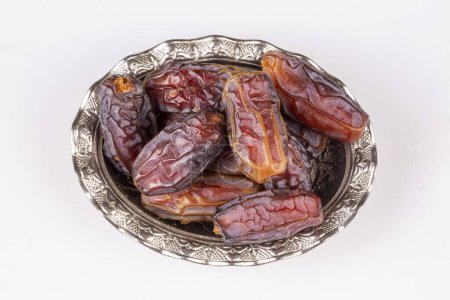 Photo for Dried date fruit in the plate - Royalty Free Image