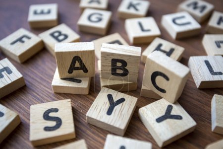 Téléchargez les photos : Wooden alphabet on the wooden table - en image libre de droit