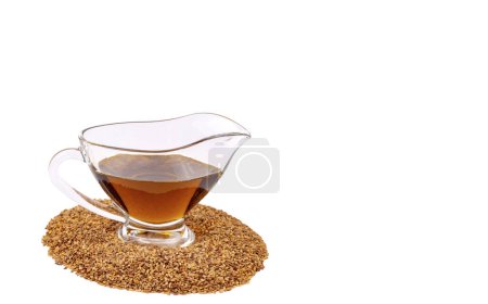 Photo for Bottle of sesame oil and sesame seeds isolated - Royalty Free Image