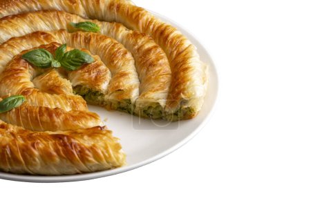 Photo for Spanakopita, greek phyllo pastry pie with spinach and feta cheese filling. Delicious handmade pies. Turkish name; el acmasi borek, rulo borek - Royalty Free Image