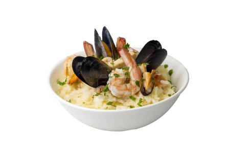 Foto de Mediterranean risotto with shrimps, mussels, octopus and clams. Seafood risotto - Imagen libre de derechos