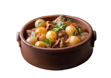 Photo for Traditional Greek dish of beef stifado in a sauce. Meat stew, onion stew. Turkish name; sogan yahni or et yahni - Royalty Free Image