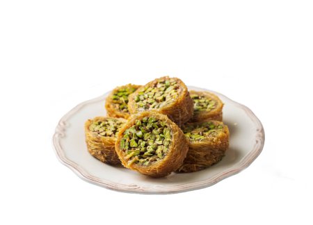Photo for Traditional Turkish desserts; Kadaif stuffed with pistachios. Turkish name; Kadayif dolmasi or dolma kadayif - Royalty Free Image