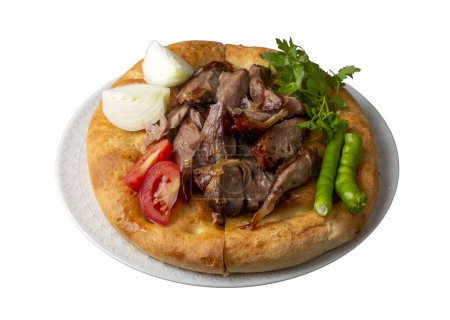 Foto de Delicious meat dish from Turkish cuisine; Konya oven kebab, tandoori kebab. Turkish name; Konya furun or firin kebabi, tandir kebabi - Imagen libre de derechos